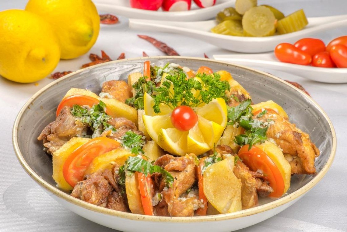 صينية الدجاج والبطاطس بالليمون